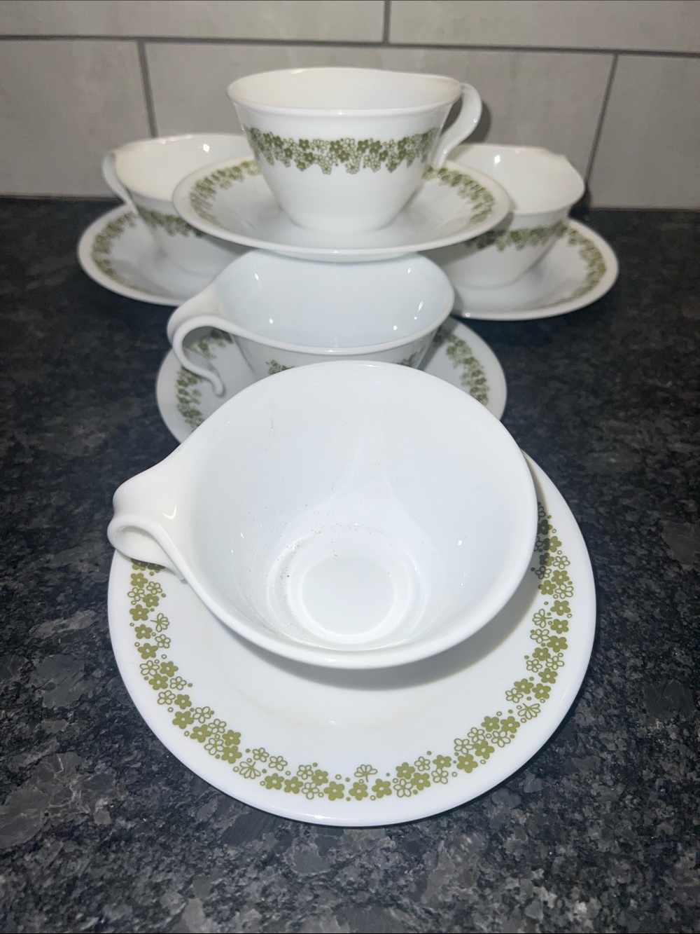 Corelle CRAZY DAISY Teacup and Saucer Set with Green Floral Border. EXC COND